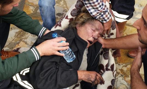 Yangından kaçarken köpeği ile asansörde kaldı!