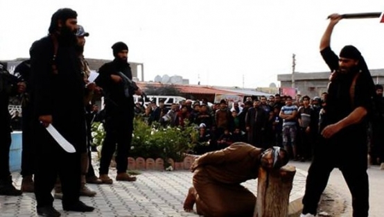 IŞİD sihirbazın kafasını kesti!