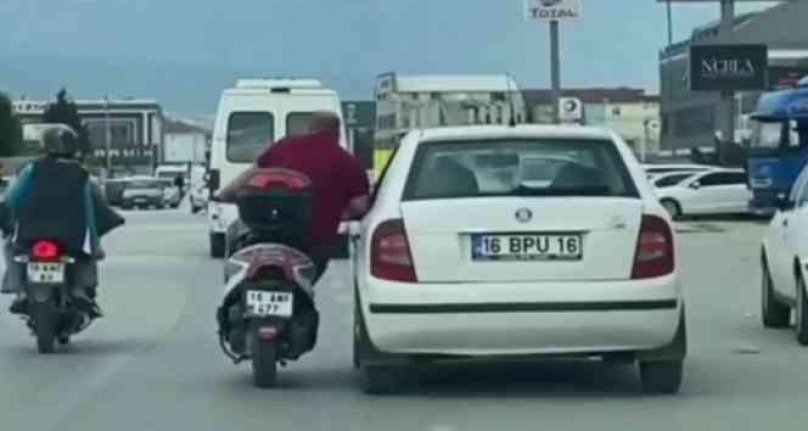 Bursa'da trafikte tehlikeli yolculuk… Canını dakikalarca hiçe saydı