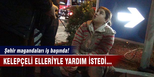 Kelepçeli elleriyle yardım istedi