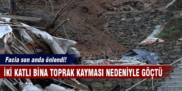 Toprak kayması iki katlı binayı çökertti