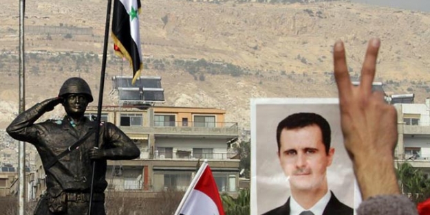 Esad sivilleri kurşuna dizdi