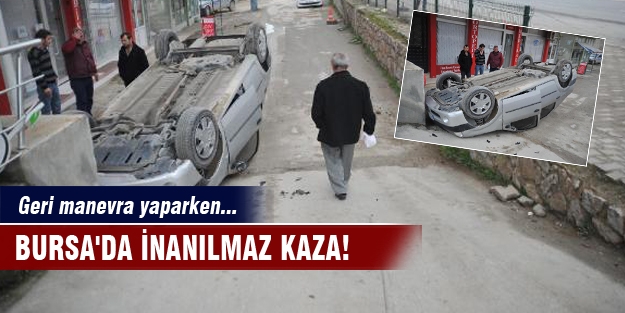 Bursa'da inanılmaz kaza! Otomobil 1,5 metreden düştü