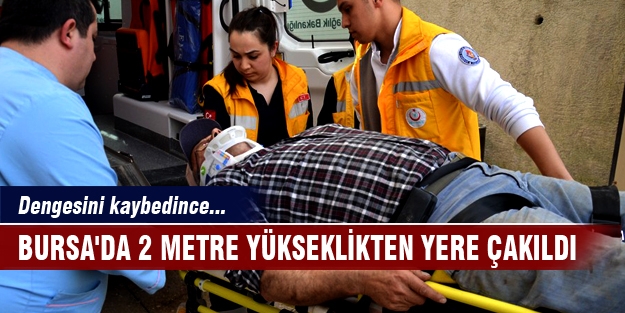 Bursa'da 2 metre yükseklikten yere çakıldı