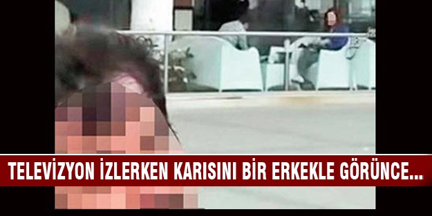 Televizyon izlerken karısını bir erkekle görünce...