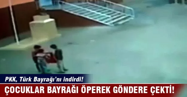 PKK'nın indirdiği bayrağı çocuklar öperek astı!