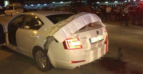Ceset bagajın üzerine düş