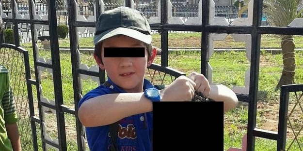 Işid Militanı, 7 Yaşındaki Oğlunun Suriyeli Askerin Kesik Başıyla Fotoğrafını Çekti