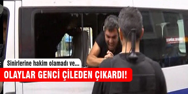 Ülkücü genç polis aracına kafa atıp camını kırdı