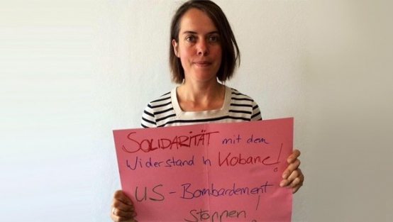 Alman vekilden tepki çeken pankart